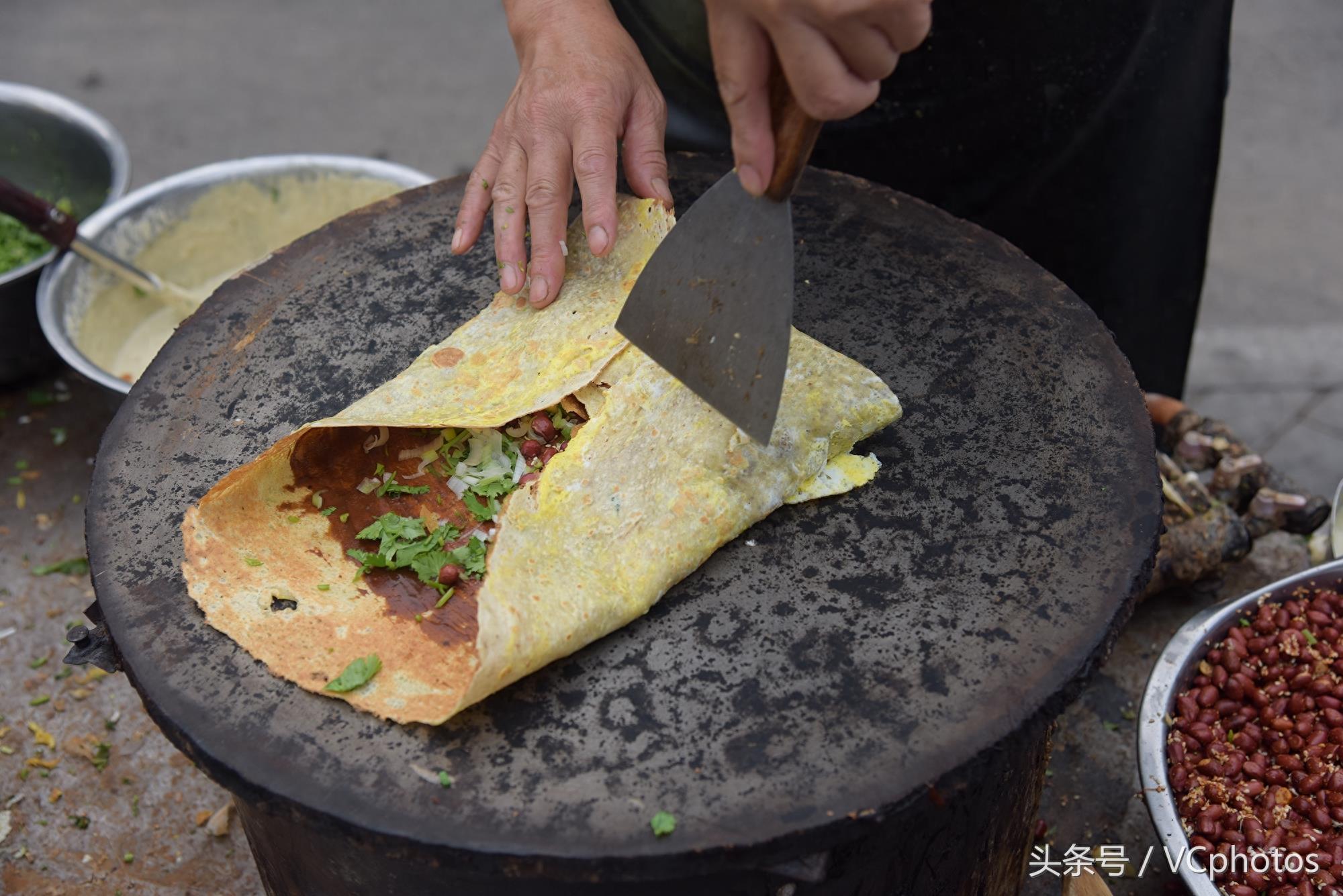 三十年口口相传，白毛煎饼何以成为北京街头的煎饼之王